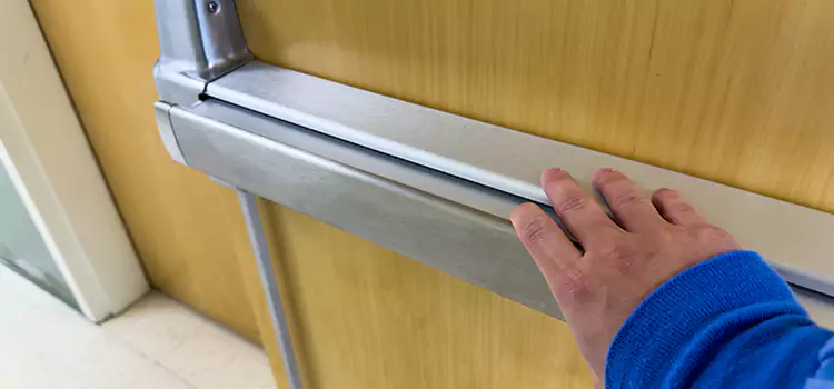 Installing a Push Bar on a Door Country Club